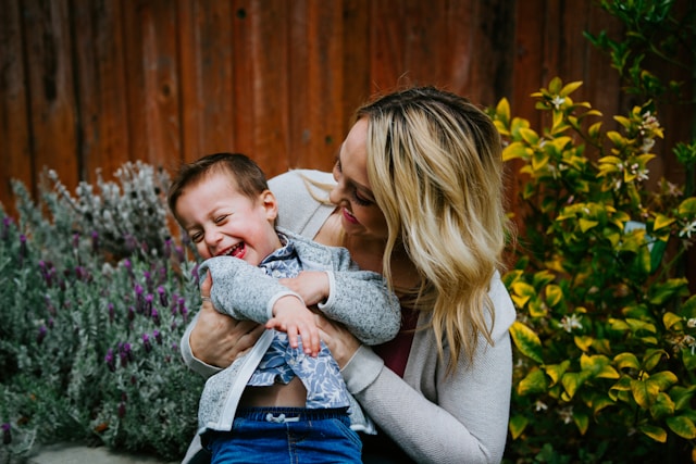 Mom and son laughing